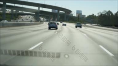 开车城际高速公路这些洛杉矶加州美国散焦视图车玻璃挡风玻璃忙号州际公路高速公路模糊郊区多个车道车道相机内部汽车